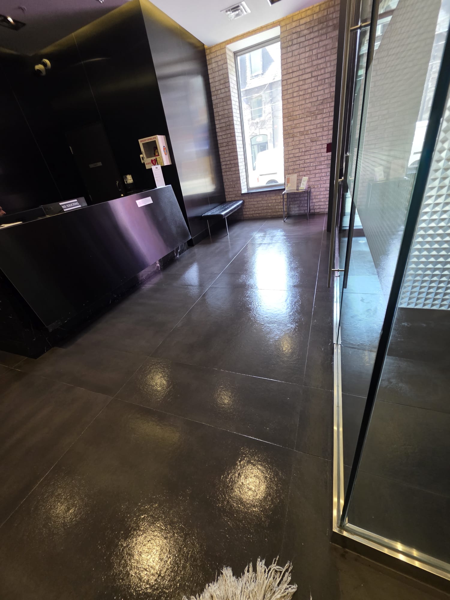 Shiny lobby floor after waxing