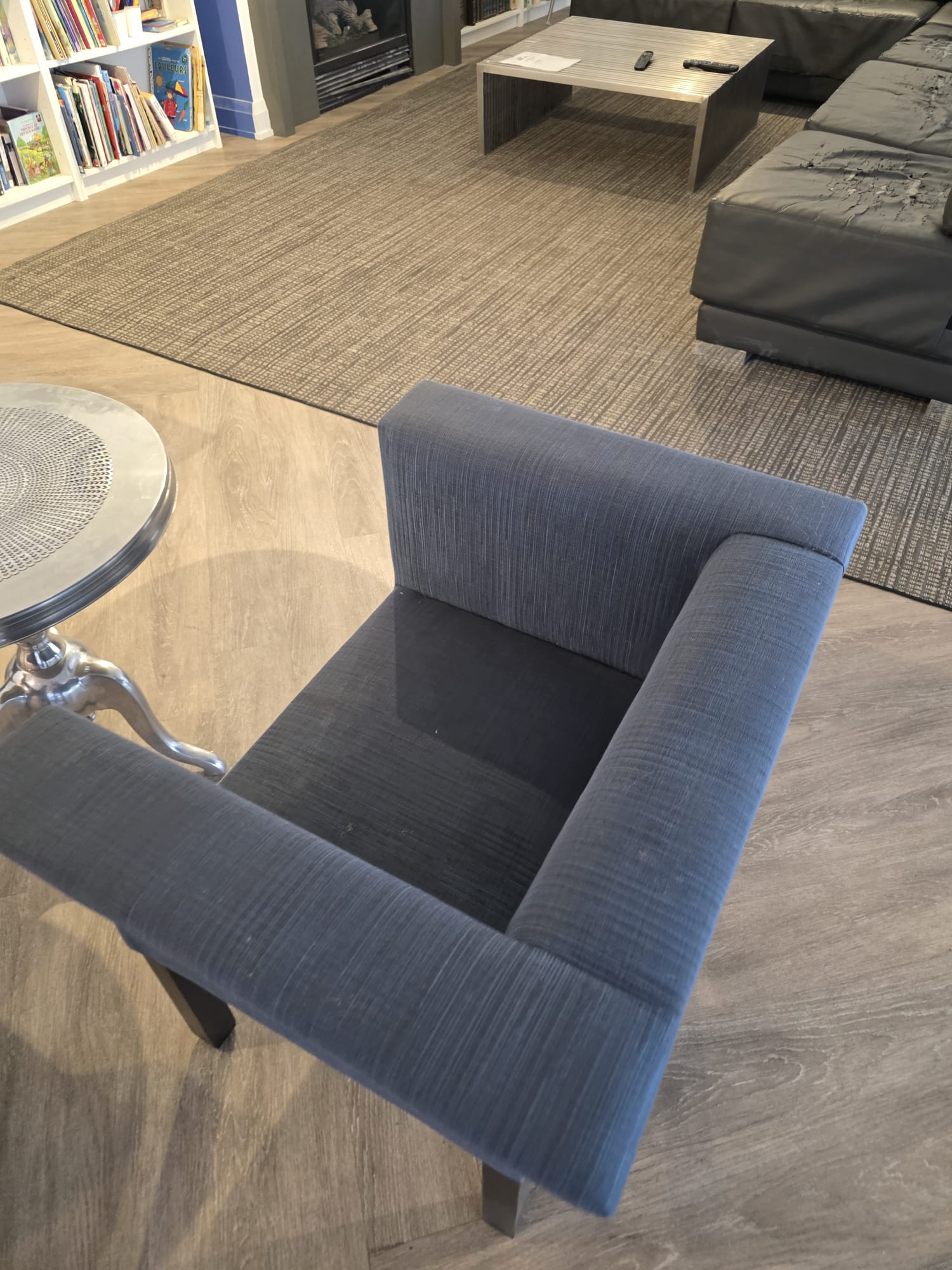 Clean lounge area with sofa